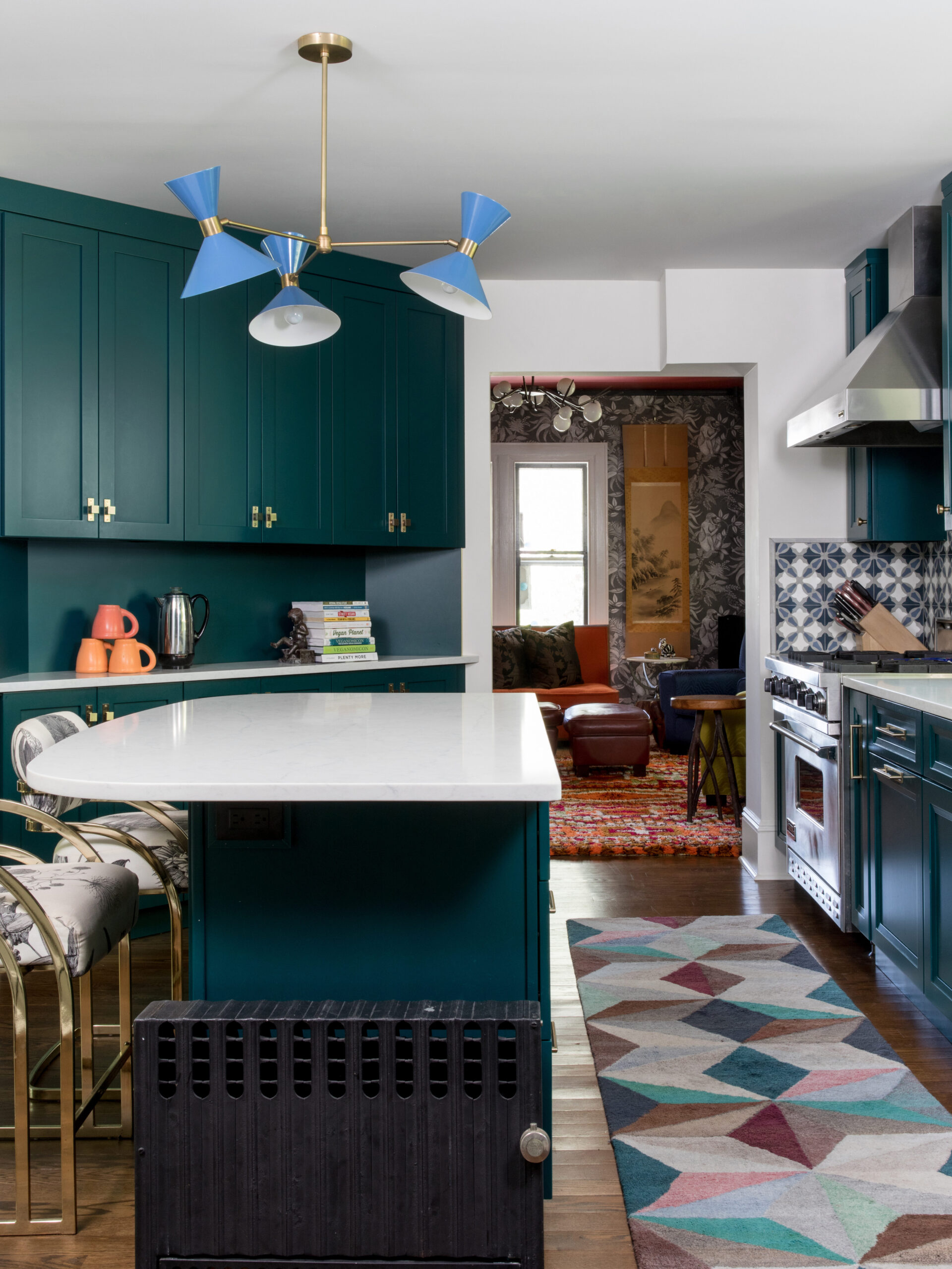 After image of a modern kitchen with blue paint.