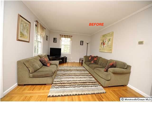 A before image of a living space before a designer.
