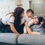 Family on indestructible sofa