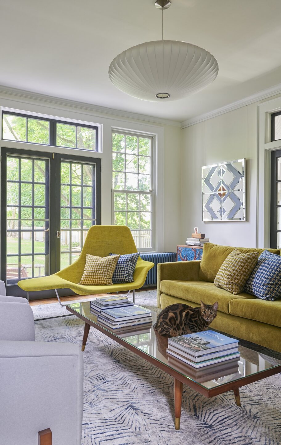 styled-vignette-of-chaise-in-a-mid-century-modern-living-room-maplewood-nj